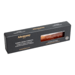 Cutie elegantă neagră de turon artizanal marca Alemany, cu fereastră transparentă care lasă să se vadă textura caramelizată a produsului.