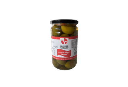 Măsline verzi Gordal picante într-un borcan de sticlă de 300 gr marca Miguel Casado, cu etichetă roșie și capac negru.